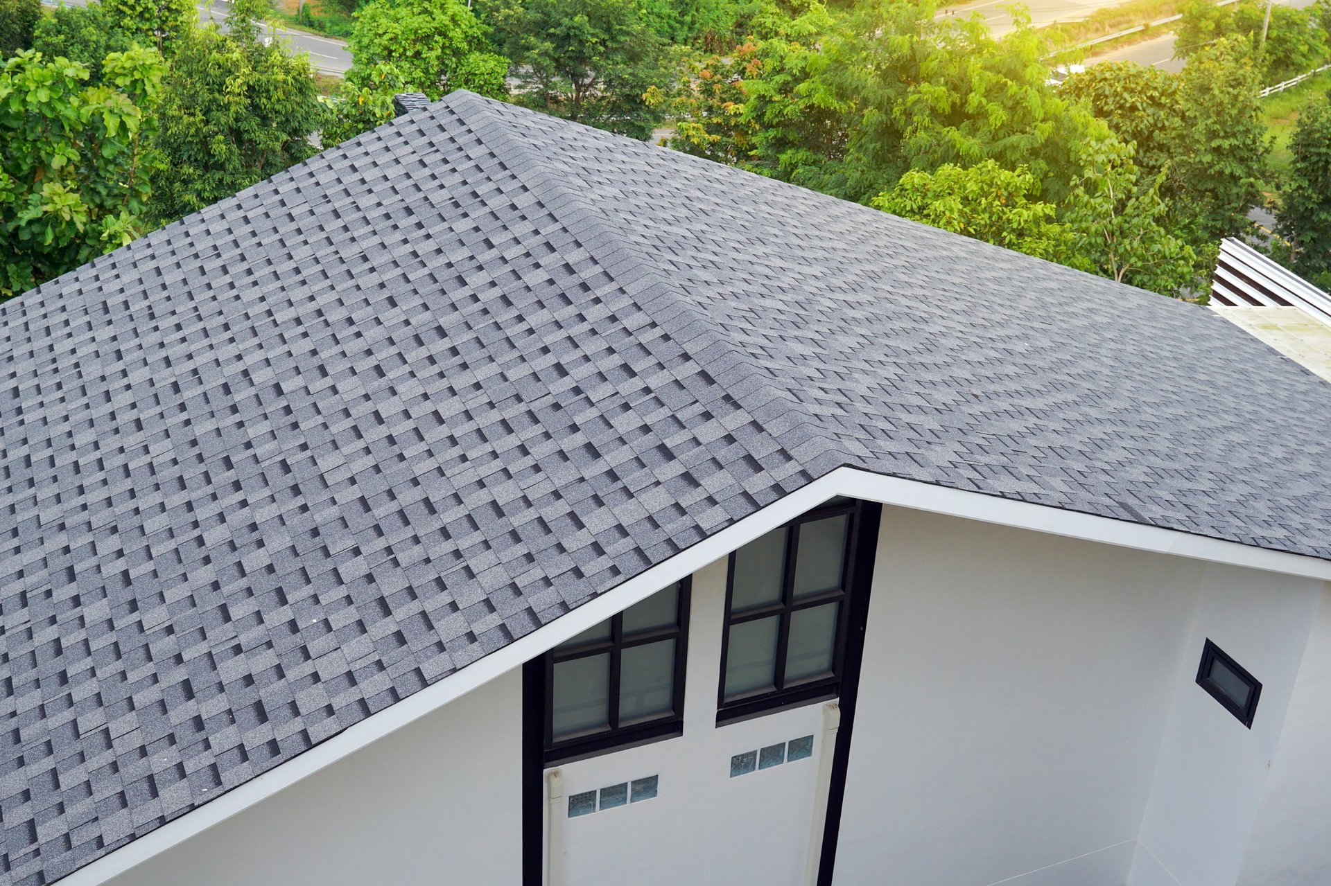 Modern house with beautiful gray asphalt shingle roof