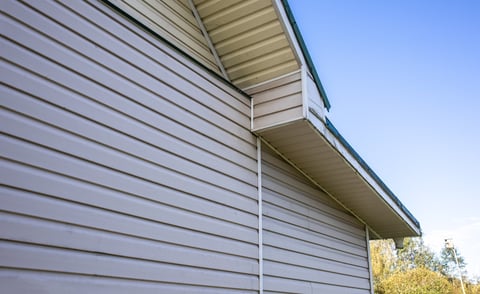 White vinyl siding installation